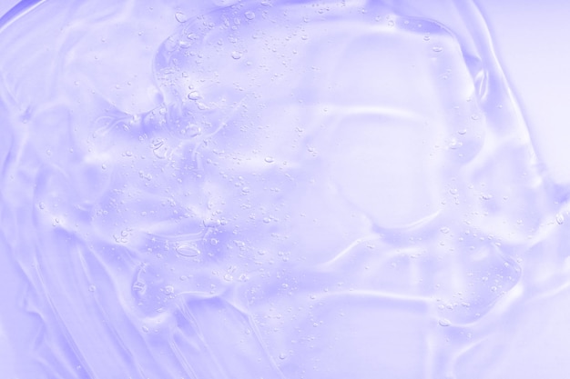 Lilac Jelly Sanitizer abstraktes Muster Kosmetisches Gel Serum Hintergrundtextur Hyaluronsäure flüssiges Hautpflegeprodukt mit Blasen Gesichtskosmetik mit Ceramid-Kollagen