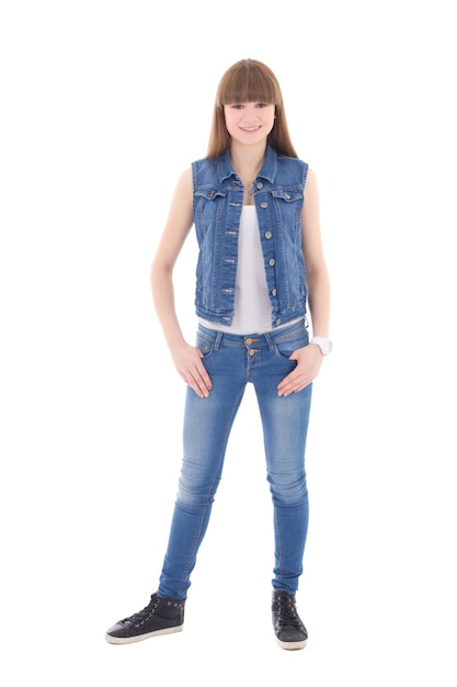 Linda chica adolescente en jeans ropa aislado sobre fondo blanco.