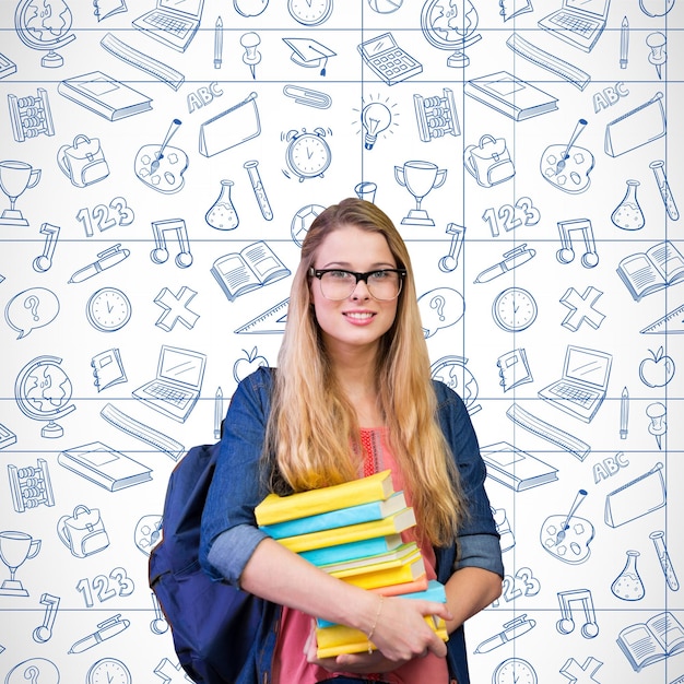 Foto linda estudiante en la biblioteca contra la escuela garabatos