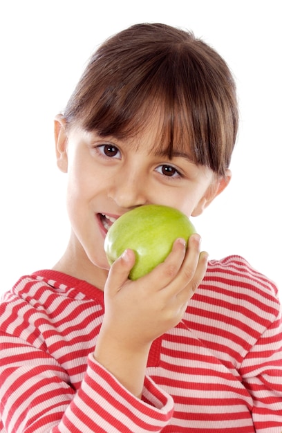 Foto linda garota comendo uma maçã sobre fundo branco