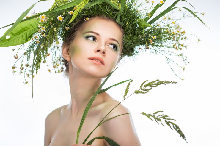 Foto linda garota usando uma coroa de flores silvestres