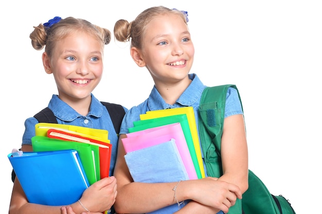 Lindas colegialas con mochilas