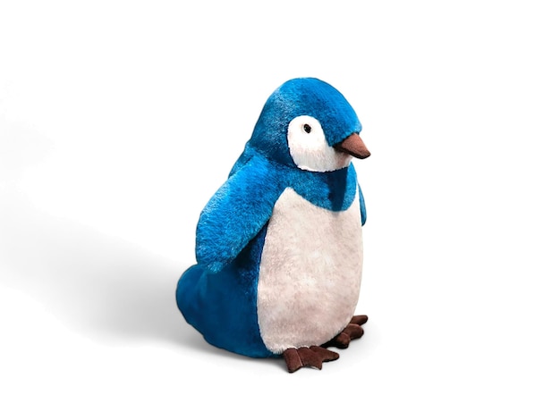 Lindo muñeco pingüino azul sobre un fondo blanco