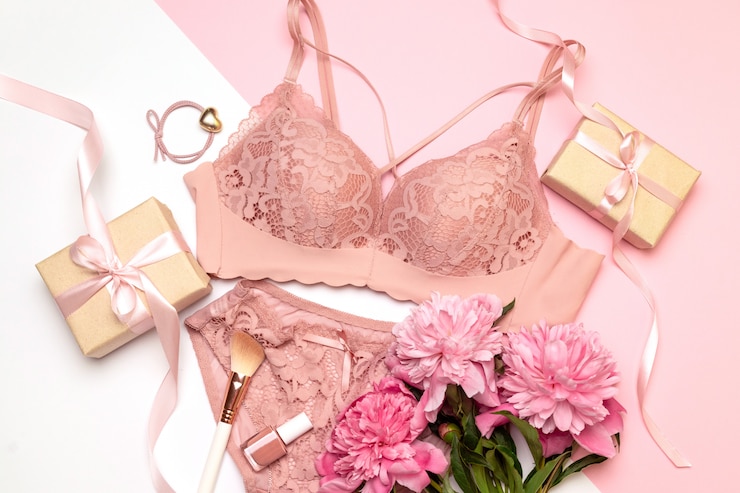 Foto lingerie feminina sexual rosa em branco