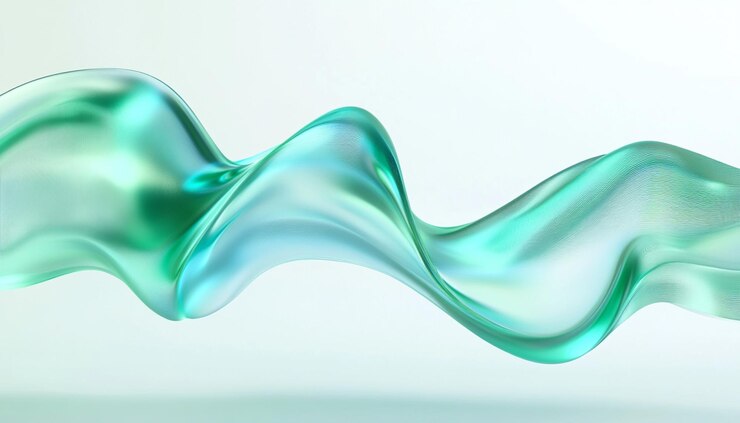 un líquido de color verde y azul está en un vaso transparente