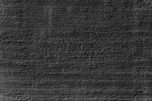 Listras horizontais de gesso. Abstrato preto. Textura de estuque preto. Superfície áspera escura.