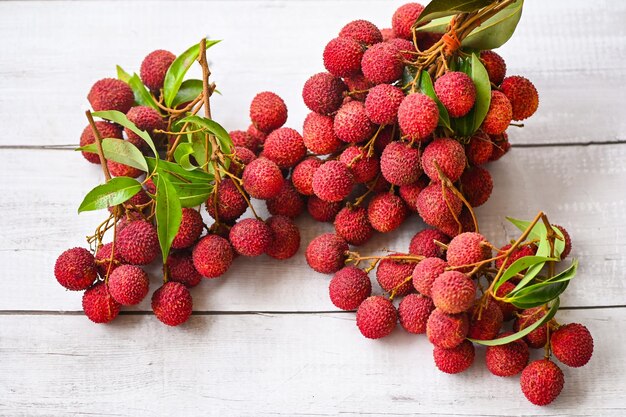 Litschis auf Hintergrund frische reife Litschifrucht tropische Fruchtlitschis in Thailand Draufsicht