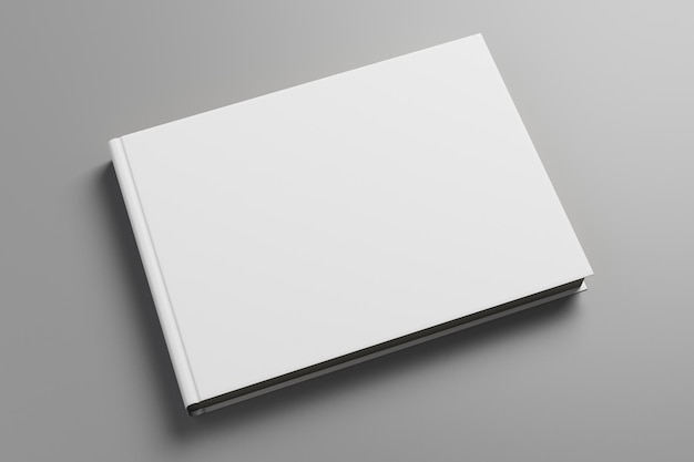 Livro branco vazio no fundo cinza