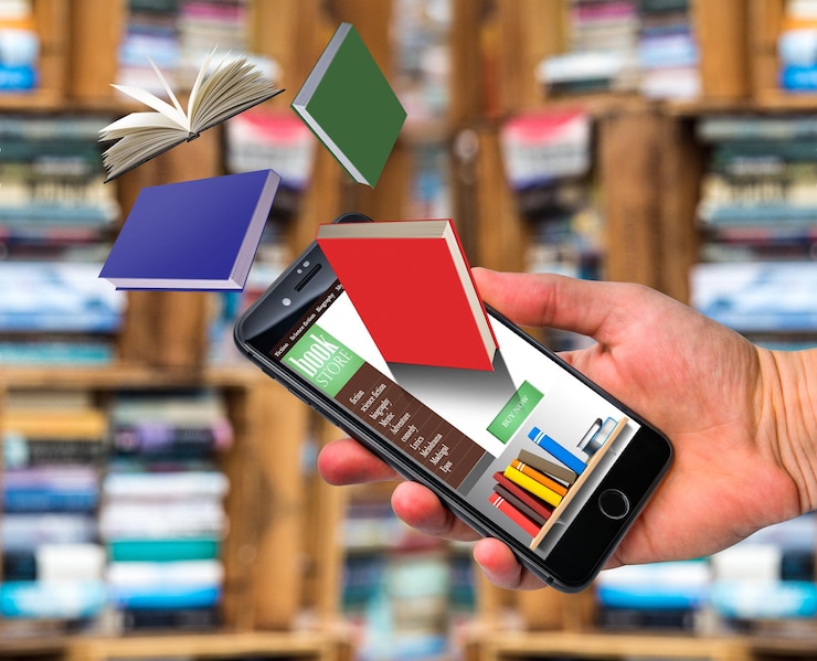 Foto livros voam para fora do telefone na mão