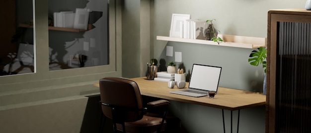 Local de trabalho doméstico contemporâneo com laptop e decoração na mesa de madeira contra a parede cinza