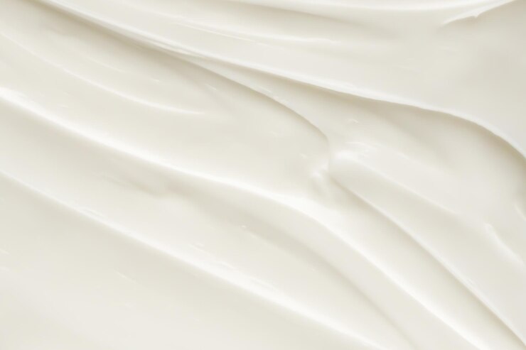 Foto loción blanca para la belleza, crema para el cuidado de la piel, textura, fondo de productos cosméticos