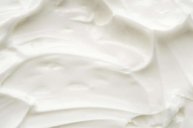 Loción blanca para la belleza, crema para el cuidado de la piel, textura, fondo de productos cosméticos