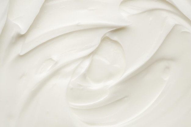 Loción blanca para la belleza, crema para el cuidado de la piel, textura, fondo de productos cosméticos