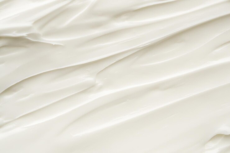 Foto loción blanca para la belleza, crema para el cuidado de la piel, textura, fondo de productos cosméticos