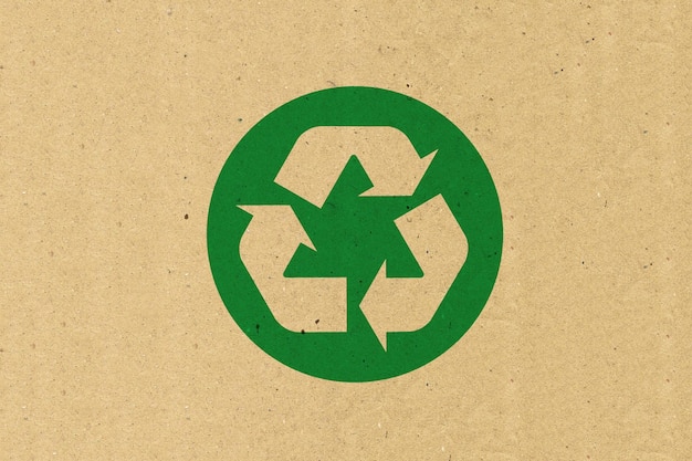 Foto logotipo de reciclaje en papel marrón