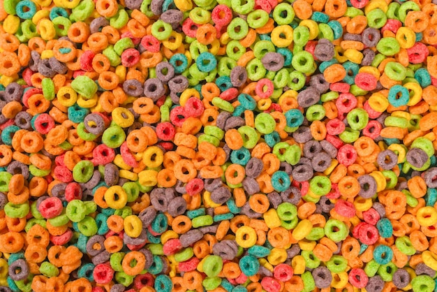 Loops de cereais de flocos multicoloridos doces como pano de fundo