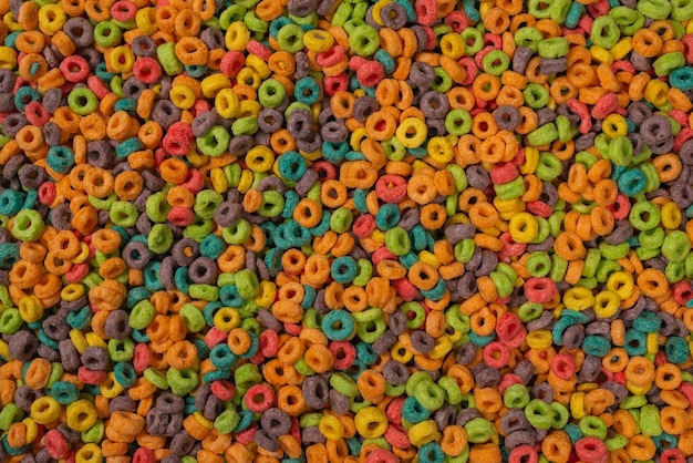 Loops de cereais de flocos multicoloridos doces como pano de fundo