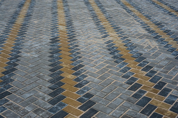 Losas de pavimentación de diferentes colores y formas Textura de losas de pavimentación estampadas de diferentes colores Superficie de carretera moderna