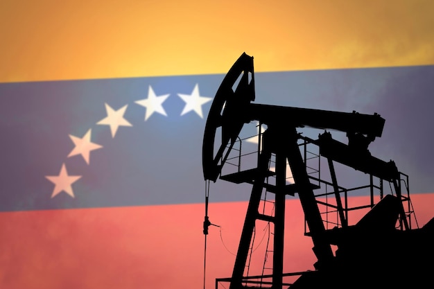 Ölpumpe auf dem Hintergrund der Flagge Venezuelas