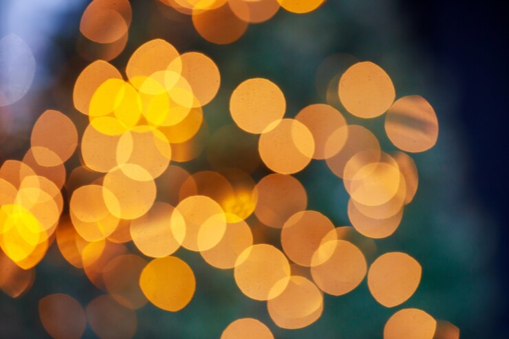 Foto luces de bokeh sobre fondo negro, luz borrosa abstracta
