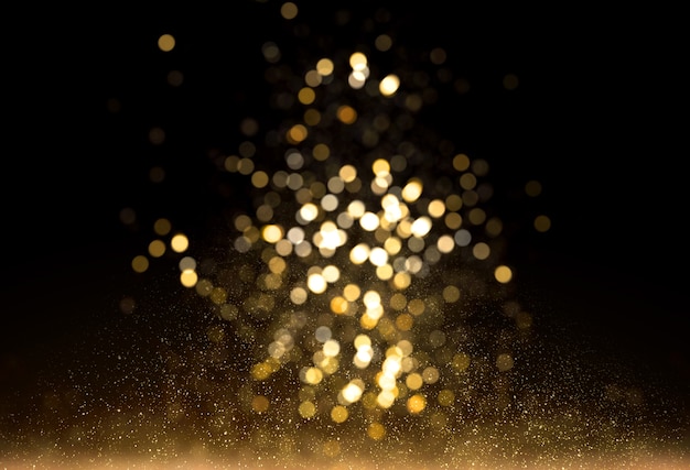 Luces de brillo dorado con fondo bokeh