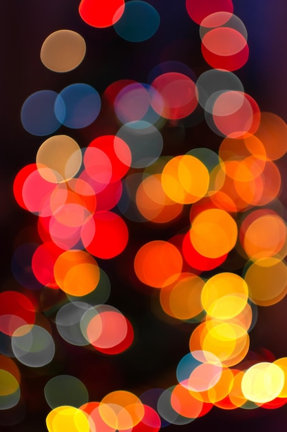 Luces de desenfoque bokeh luces borrosas luces de árbol de navidad bombillas de luz naranja roja