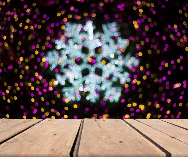 Foto luces multicolores en el suelo de madera dura