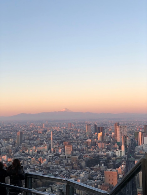 Foto luftansicht des stadtlandschafts vor klarem himmel bei sonnenuntergang