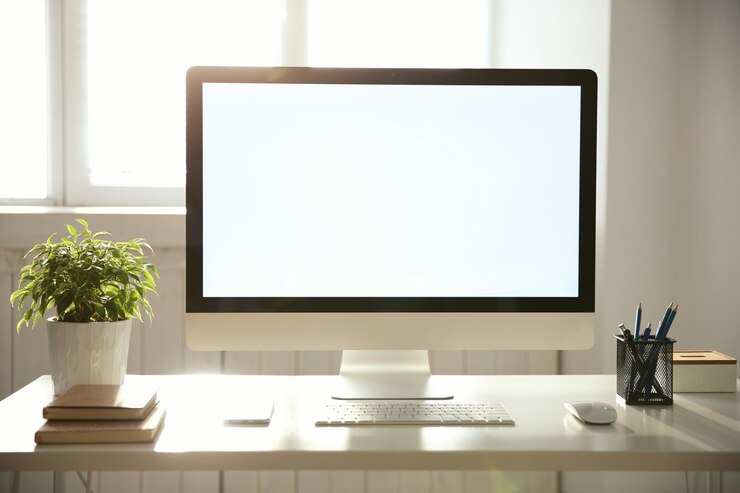 Foto lugar de trabajo con computadora moderna en la mesa
