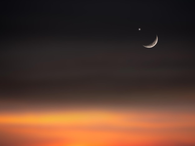 Luna creciente con estrella del cielo islámica en la noche