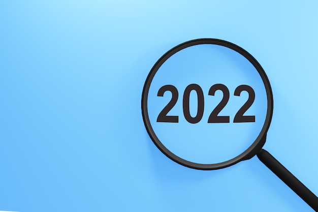 Lupa com a palavra 2022 em fundo azul