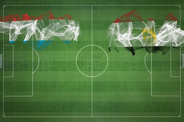 Luxemburgo vs Egipto Partido de fútbol colores nacionales banderas nacionales campo de fútbol juego de fútbol Concepto de competencia Espacio de copia