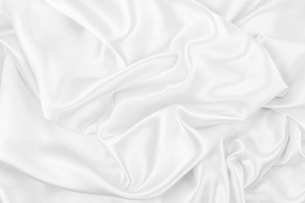 Luxuoso de seda branca suave ou tecido de cetim textura de fundo