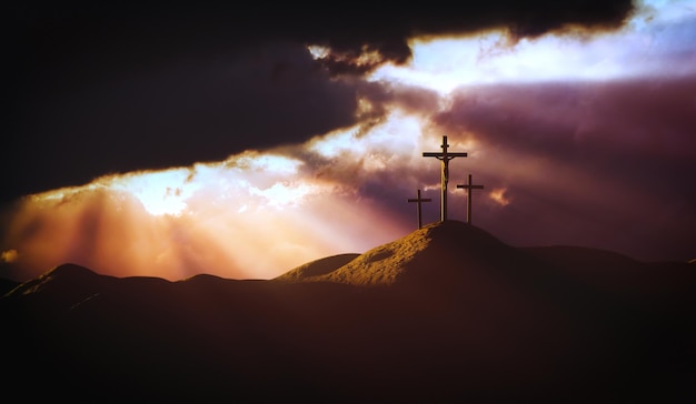 Foto luz e nuvens no monte gólgota a morte e ressurreição de jesus cristo e a santa cruz