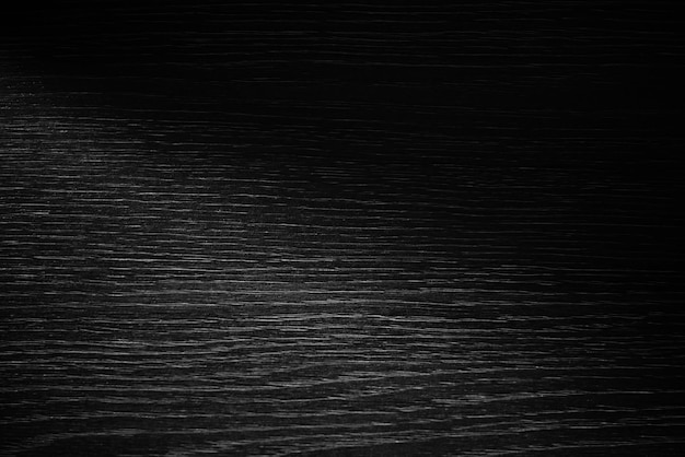 Luz sobre fondo de superficie de madera en blanco y negro