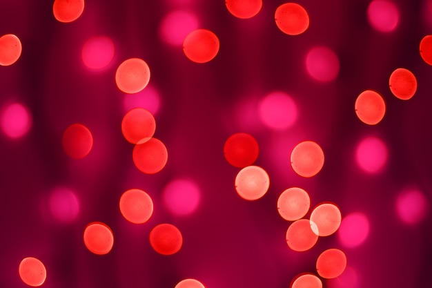 Luzes abstratas de bokeh borrado em vermelho