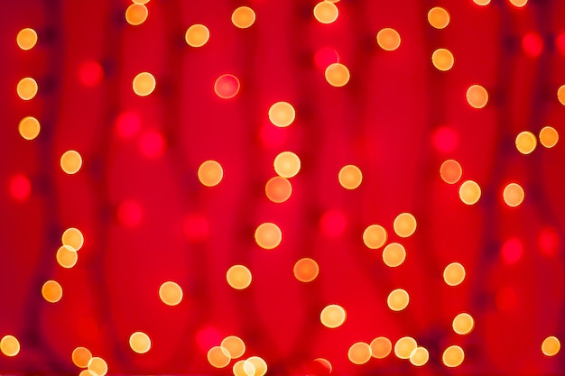 Luzes abstratas de bokeh borrado em vermelho