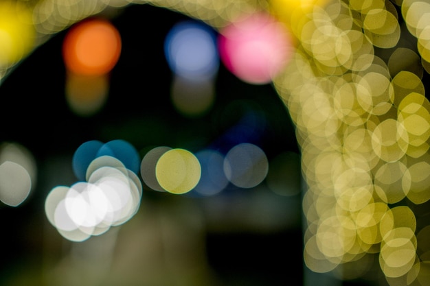 Luzes coloridas no dia de Ano Novo Luzes de círculo Bokeh imagem de fundo com espaço de cópia