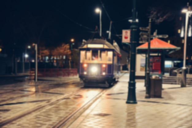 Foto luzes da cidade à noite rua borrão.