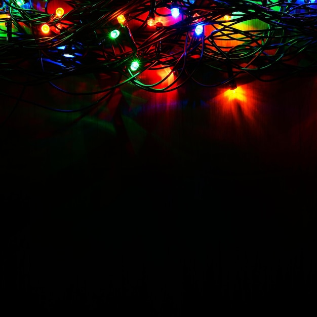 Foto luzes de natal belo fundo abstrato colorido com decorações de árvores de natal conceito para inverno e feriados xdxaflat lay copy space