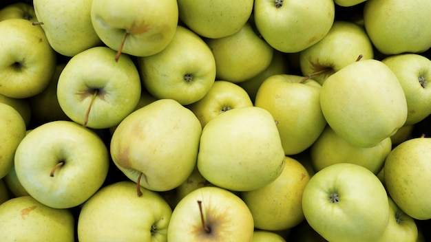 Maçã verde, fruta crua, fundos