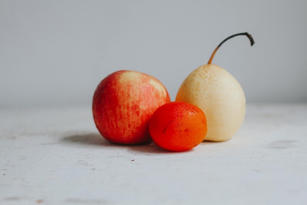 maçã vermelha pêra e tomate fruta bcakground