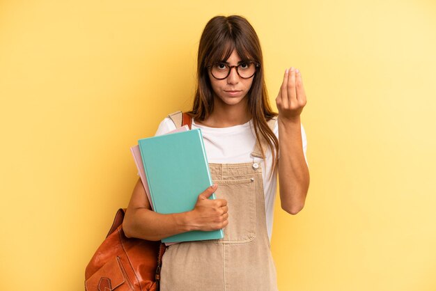 Machen Sie eine Kapitulations- oder Geldgeste, die Ihnen sagt, dass Sie bezahlen sollen