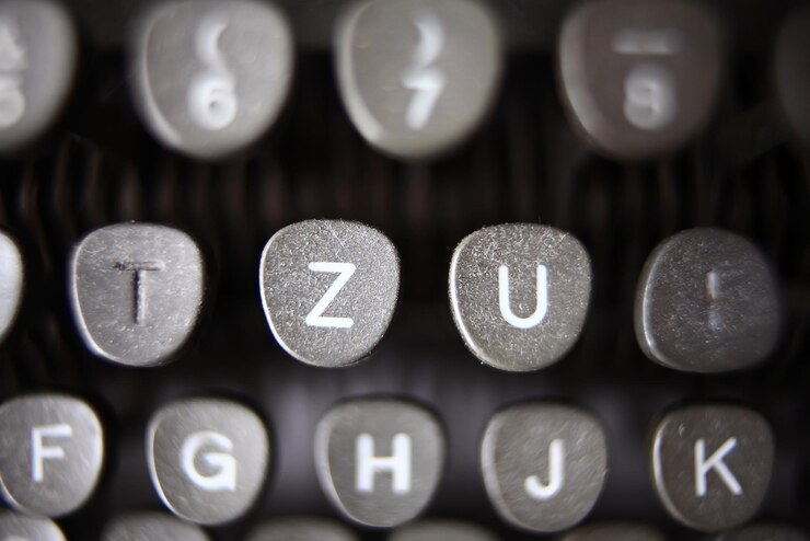 Foto macro de botão de letra de máquina de escrever