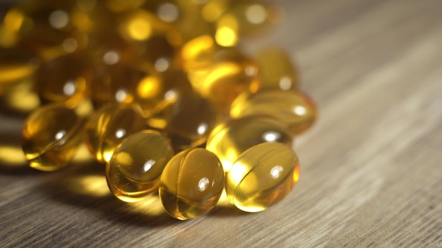 Macro de closeup de comprimidos de óleo de peixe vitaminas