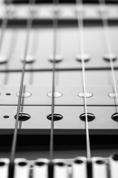 Foto macro de cordas de guitarra elétrica