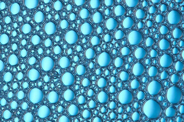 Macro fundo azul abstrato com muitas bolhas de sabão