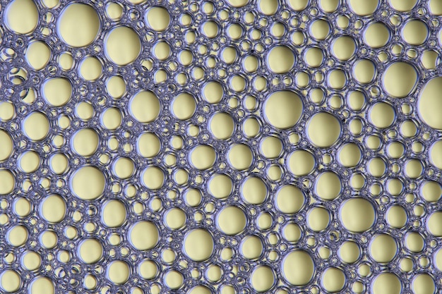 Foto macro fundo verde abstrato com muitas bolhas de sabão