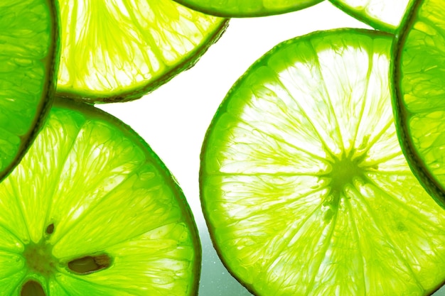 Macro Lime, Limão e limão verde sobrepostas em fatias de fundo fechado, Macro textura de limão, Macro