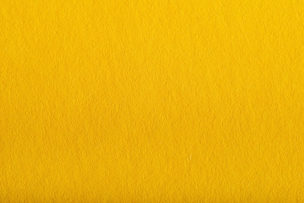 Macro textura de papel de color amarillo